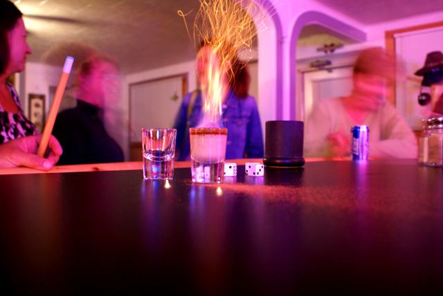 There was quite the party on the north end of the lake on Friday.  Ed and Kyla had a wonderfully warm campfire, great food, beer and other drinks, and live music, but there was a dearth of flaming shots.  This was not the case on Saturday night at the bar.  We need rain.