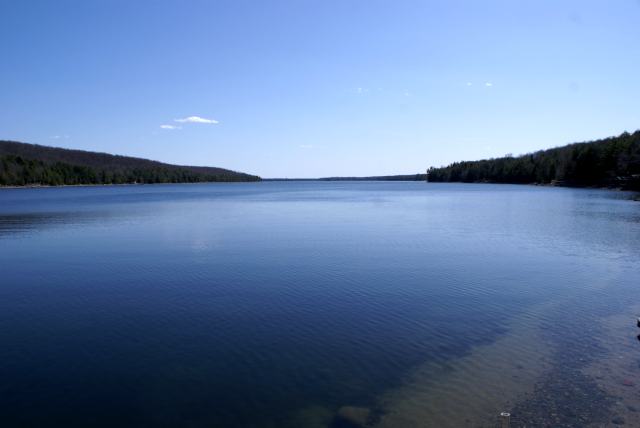 The lake is down.  Winter did a poor job this year of bringing the level up.  Now it's up to spring to supply the storms needed to push the lake level up a foot or two (or three, or four).  We measured 0.4 inches of rain last week.  Spring will have to do better than that to get my respect.  The water remaining is clear and cold.  Swimming and skiing will have to wait a week or two (or three, or four).  The smelt run on the lake this year was great if you don't count the lack of any smelt.<br><br><br>-Nemo