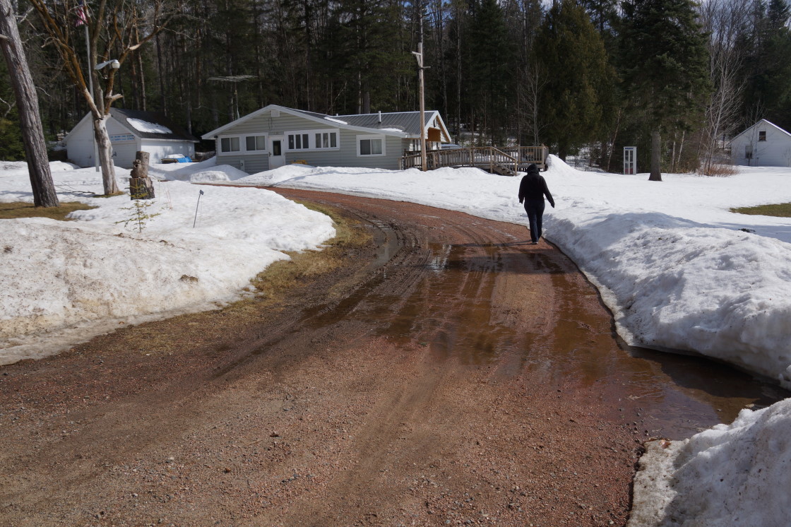 It turns out that under all that snow, ice and misery, there's solid ground. It has been so long since snowlessness that, until this week, ground was just part of the lakes oral history. Stories passed down from generation to generation spoke of hatless peoples walking the shores without boots and something called a lawn. So much time has passed that it was hard to separate myth from reality. It turns out that solid ground is real.