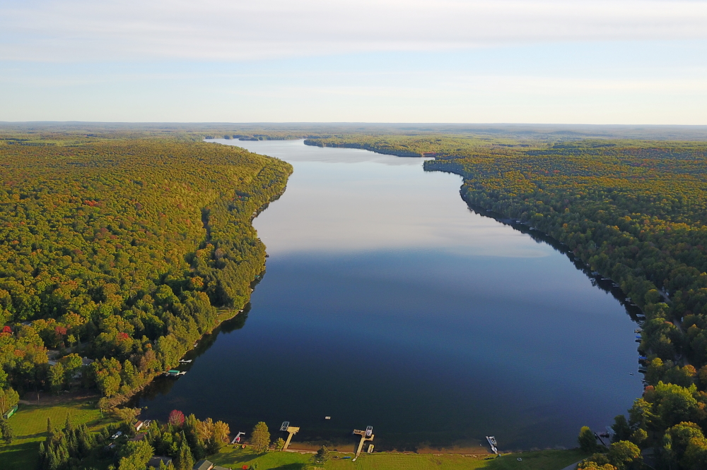 The lake area turned a seasonal corner last week. Skiers and swimmers had been suffering with cooler temperatures since Labor Day, but last week those temperatures dropped close to November. Along with the cold came some color in the trees and a falling lake level.