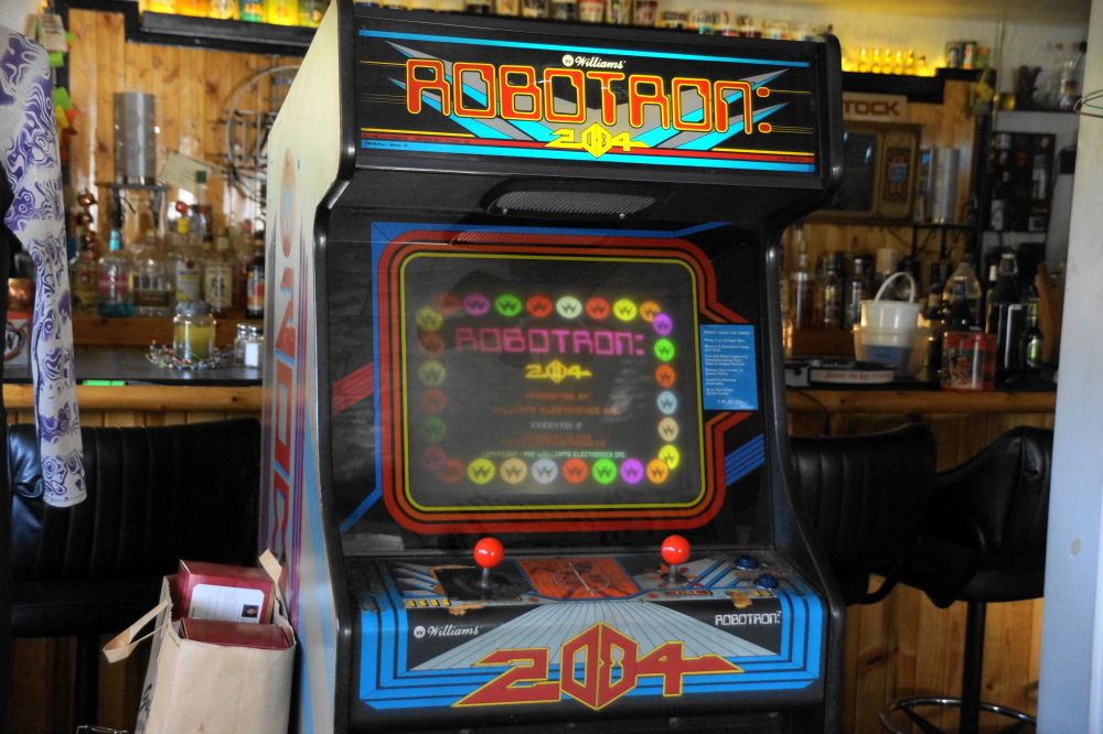 It took a little time, some circuit diagrams, and a multi meter, but another game was brought back to life and added to the bar's collection.