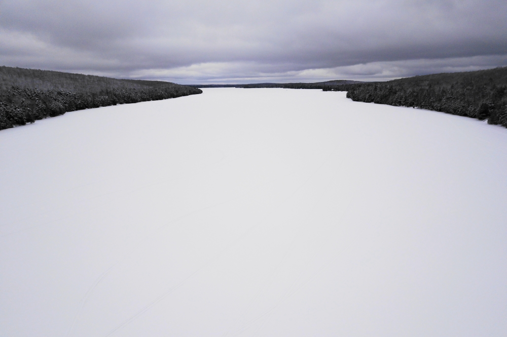 Last week, Bottle Rocket War week, started off mild with a cloudy sky and an unseasonably thin blanket of snow covering the lake. We would have liked more of the white stuff for forts, but it would have to do.