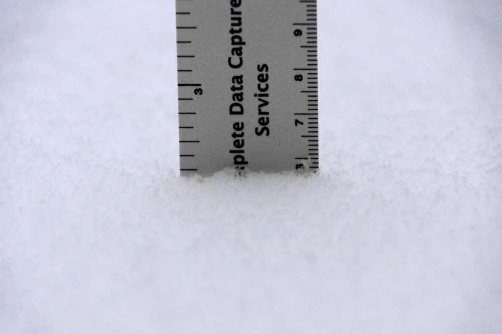 On Friday morning we were blessed with about 2 inches of snow with another inch or so coming later in the day.  Fort building would be easier.