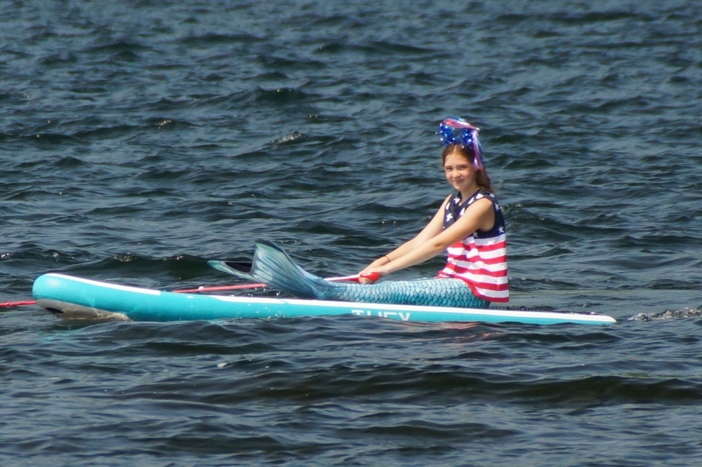 The boat procession subject matters included towable, mythical water creatures, 