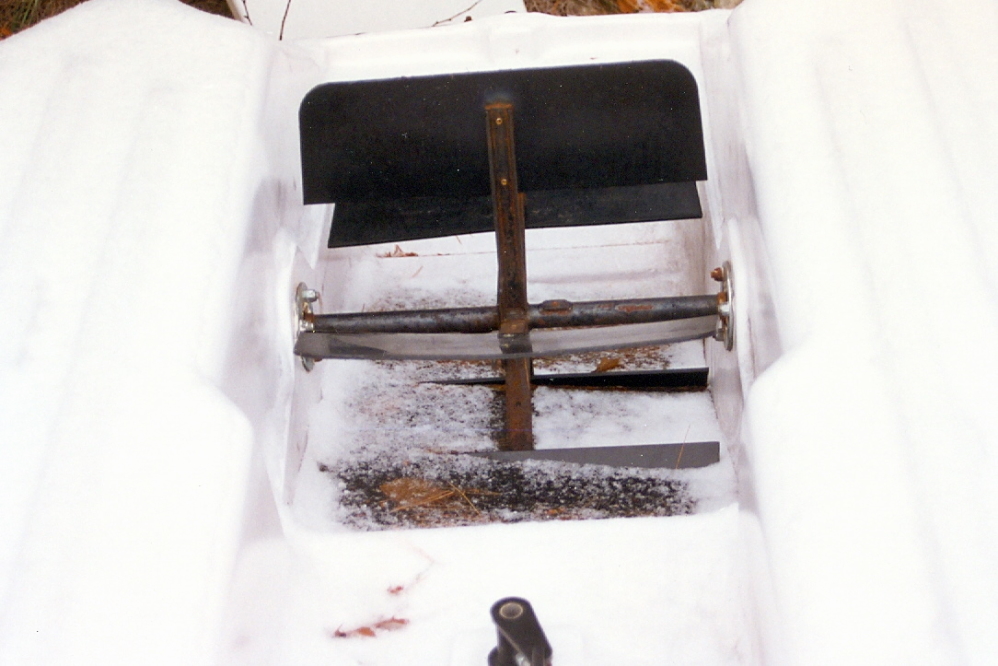 The plan was to flip the paddle boat over and peddle around the lake to take in the sights. It must have rained earlier in the week and the accumulated water in the paddle well froze tight. After an hour or so of trying to thaw the mechanism, we launched an ice free canoe.
