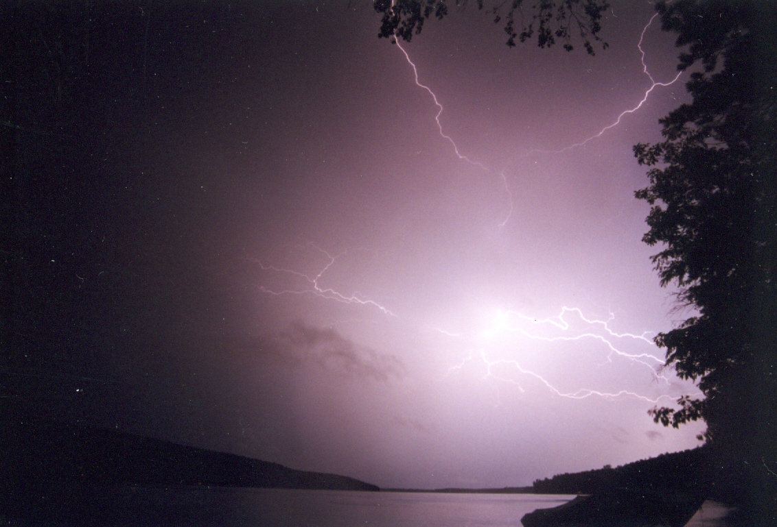 Crack-BOOM. It had not rained for over five weeks. The lake has dropped 16 inches since spring. We needed a storm and a storm we got. With the great light and sound show, came a goodly amount of rain. Take that falling lake level! Of course the lake needs more rain to bring it back to the depths of Spring, but this was a good start. We'll be back in a few weeks to catch some of those big perch and get some final skiing in before the boat pulling of Labor Day.<br><br><br>-Nemo likes his nights stormy and lake deep.
