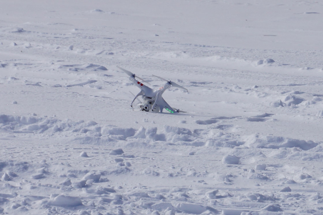 The landing was very controlled and smooth until the rotors were shut down and the snow under the back of the craft gave way. There was some tension but no damage.