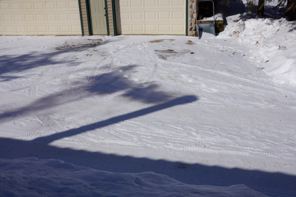 The shadows of wood burner stacks on Knott Lake indicated who was up at the lake and who was not.