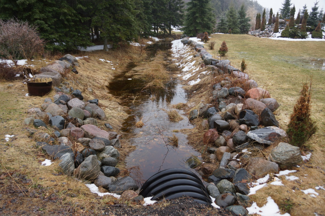 In between storms, melt water swelled streams and creeks flowing into the lake. Lake Lucerne clearly looks higher than it was last Fall. Huzzah!