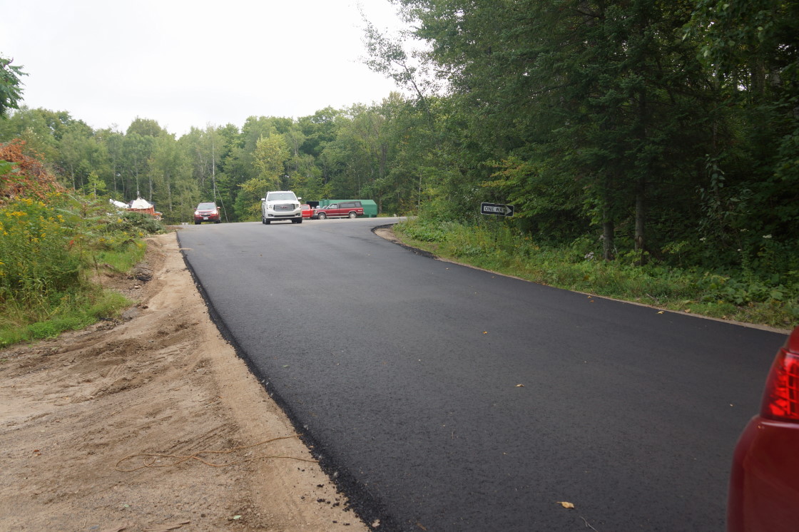 The road to the dump is now paved! No more of the shame of having to haul garbage down a gravel road for us. Huzzah!