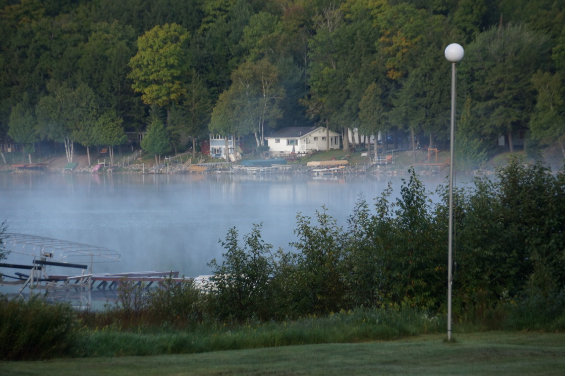 The lake steamed some mornings. Swimmers were most upset by this surrender of lake heat.