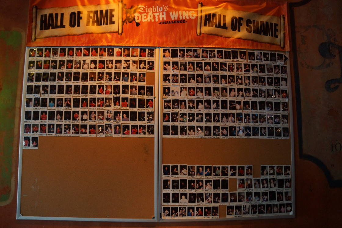 With the cold weather a coming, you'd think eating hellishly hot wings would be a cool story, but the humiliation and pain in the faces on the hall of shame told us a different story. Pass. 