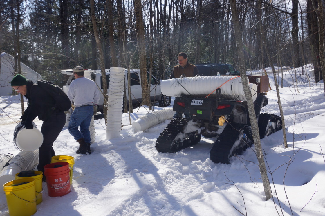 On the weekend, it was time to start the alchemy by joining spile to maple. There were also drills, buckets, lids, and an ATV with feet.