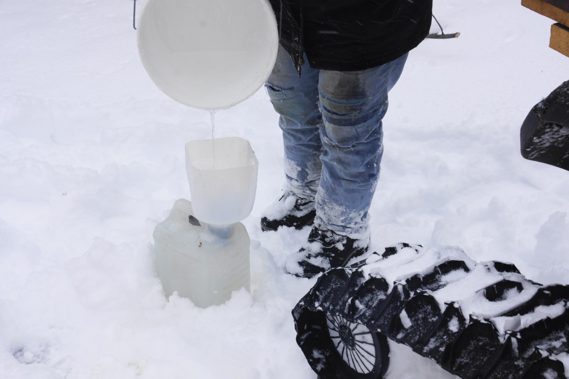 The cold coupled with the snow finally slowed the taps and we were able to get all the sap to the boiling pans.