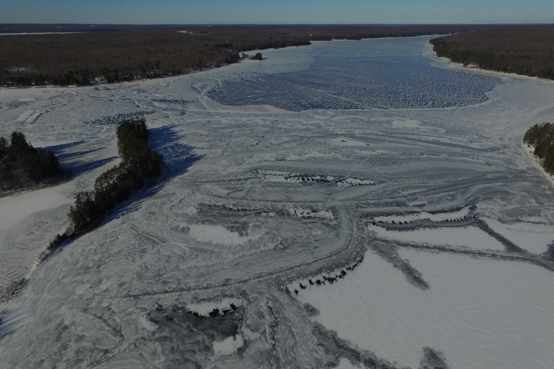 Less than a week after the last liquid firmed up, the lake was safe to walk on. Cars and snowmobiles piloted by the sane would have to wait a few more days.