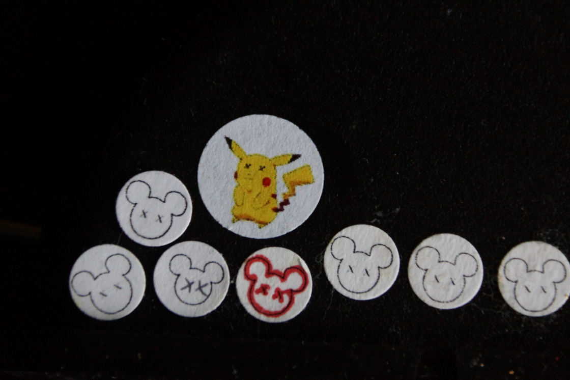 Every time one of the the bar's mouse traps scores a victory in man's war against vermin, we've added a "Dead Mickey" sticker to the trap's superstructure. Due to recent pokemon revelations, the mouse trap stickers have been augmented.