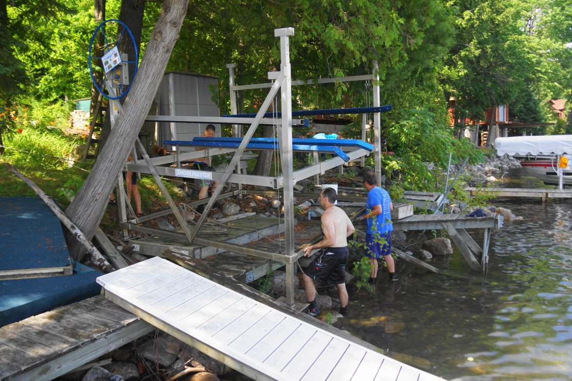 In a sign of upcoming seasonal doom, the first boat lift was excised from the lake last Sunday. It didn't go too badly, but the "Advil&trade; Moon" turned out to be aptly named and underscored.