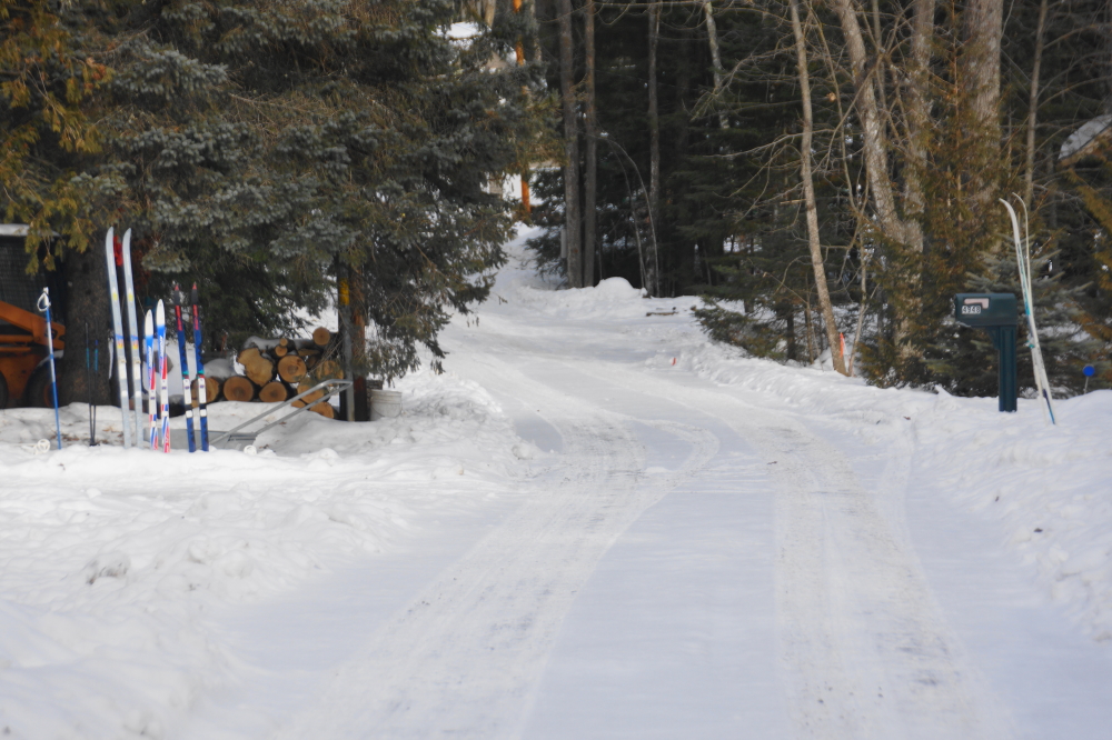 The ice layer under the snow is making Knott Lane, and many other roads North of Hwy 64, treacherous. The wintry math of this transportation system is easy. Low coefficient of static friction plus gravity equals bruises.