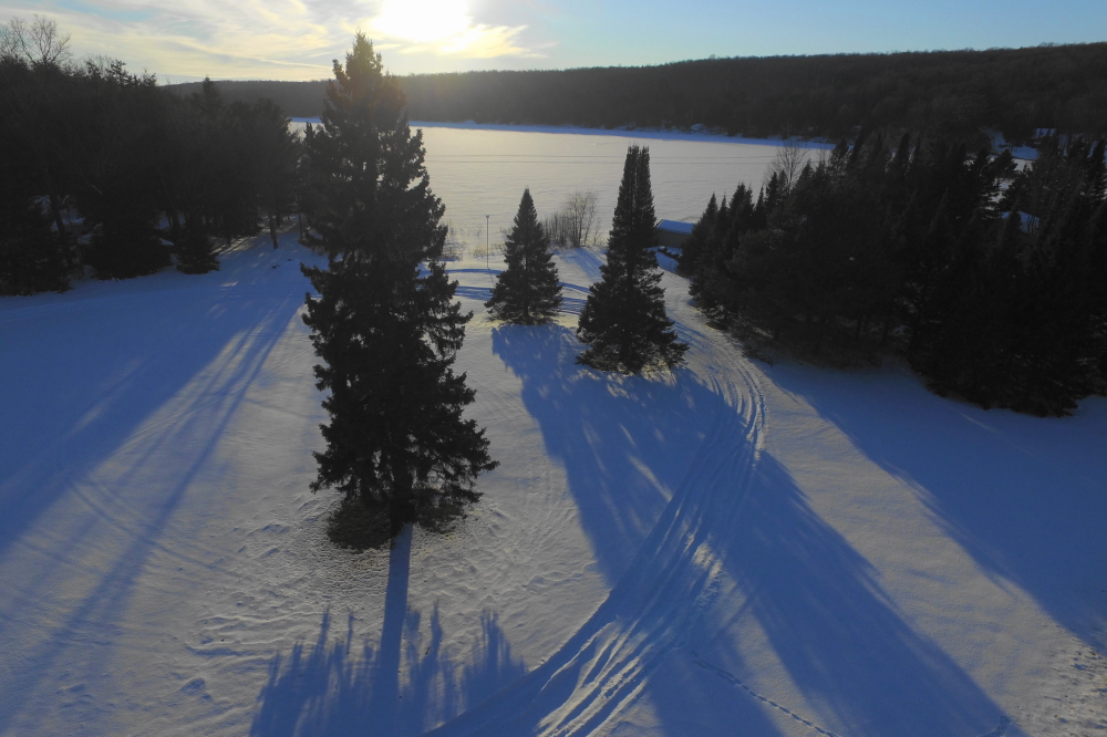 It warmed up last week. A January thaw is not uncommon nor unwelcome. The transitory nature of a January thaw inserts more than a minor amount of melancholy into the 40°F air, but for a brief while the roads were ice free and melt water was flowing into the lake.