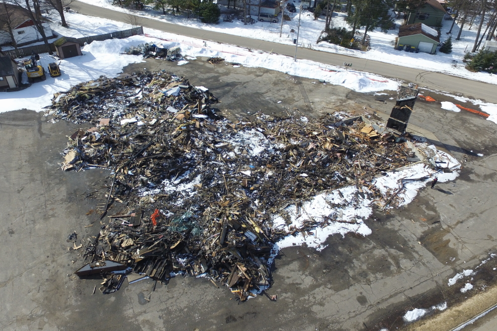 We really wanted to get a picture of the old Cheney's Supper Club before machines finished off the job started by a fire a few months ago. Missed it by 3 days.