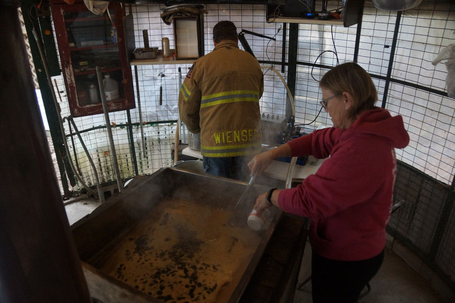 The last batch of maple syrup was boiled down, filtered, and bottled.