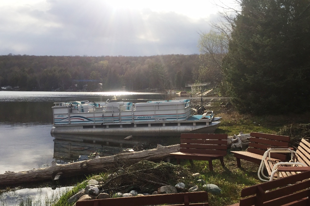 Other boats are already there. The back of this pontoon boat was about a yard from the lake last Fall. Some fire pits are just a foot or two away from becoming fine fishing spots.