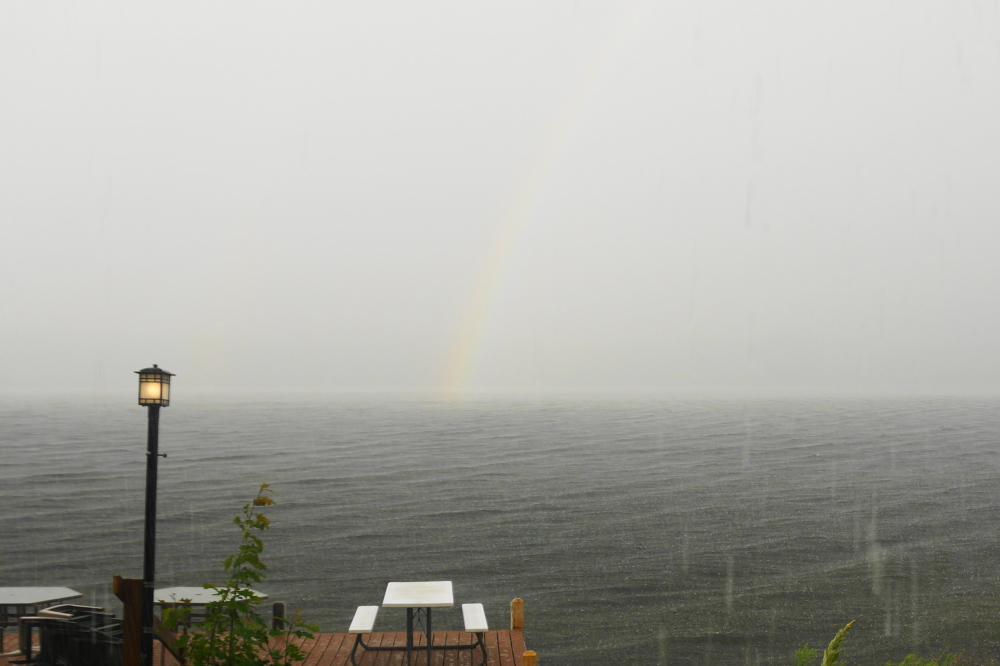 It ended in 12 minutes leaving only a rainbow, a higher lake, moister campers, and a dripping sound.