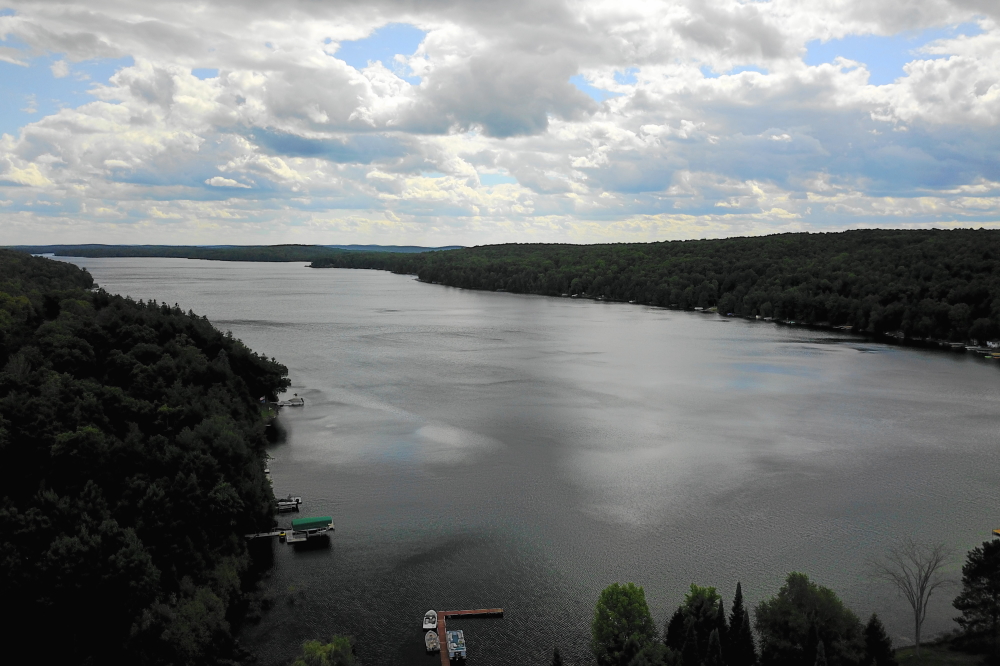 The forecast last week could have been "Summer with impending gloom". It started off sunny and calm (and a little cool) and ended in rain (also with a little cool). The lake temperature is hovering just above 70°F, which should keep the swimmers pinkish and talk of ice-in among the men at a minimum. It might be best to pick up a tow rope and get in as many runs as possible to ward off any post hypothermic flash backs of calm skier-less waters. It also might be a good idea to begin to line up a crew to pull boats, lifts, and piers. Unless you enjoy doing such tasks by yourself. Then give us a call and we'll set up a time in a few weeks for you to pull our lift too, thus doubling your enjoyment!<br><br><br>-Nemo does not enjoy such tasks even with a hoard or more.