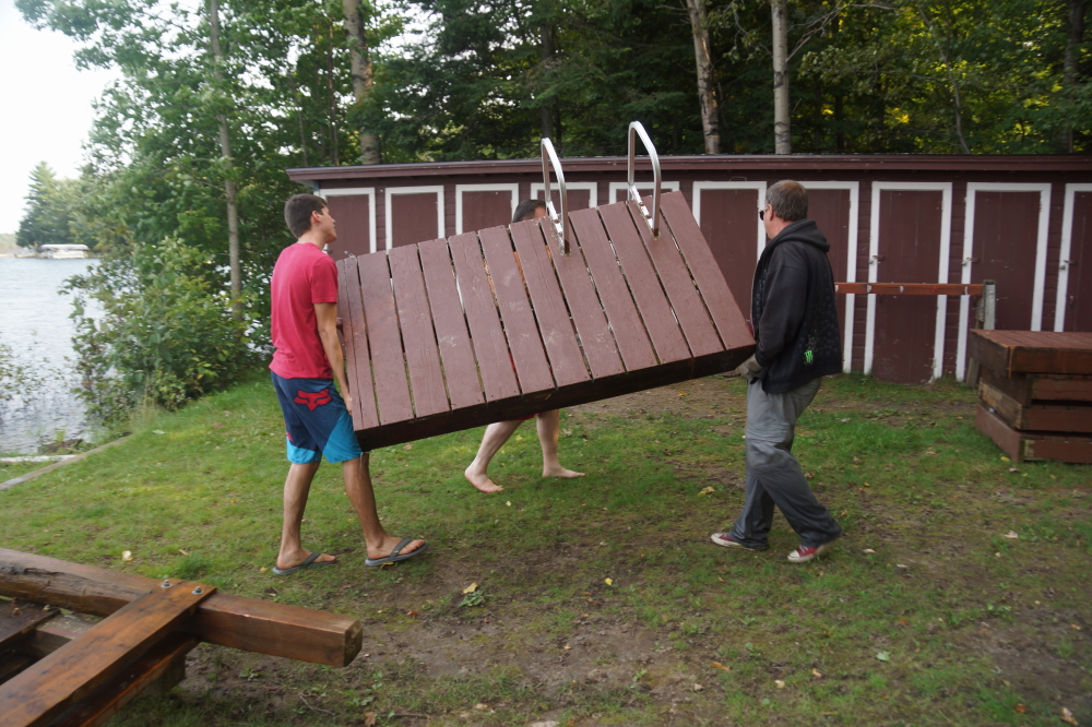 We had anticipated a few lost hours, injuries, and a possible drowning, but a strong crew had the dock stacked on the shore in less than an hour with no broken or semi-broken personnel. Huzzah!