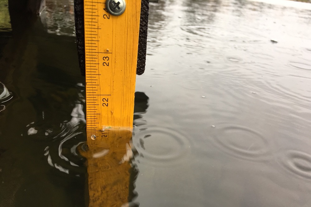 The rain was not enough to hold onto the record levels Lake Lucerne had reached just a few weeks ago. It may be down a bit, but 21 inches above the nail is still disturbingly high for this time of year.