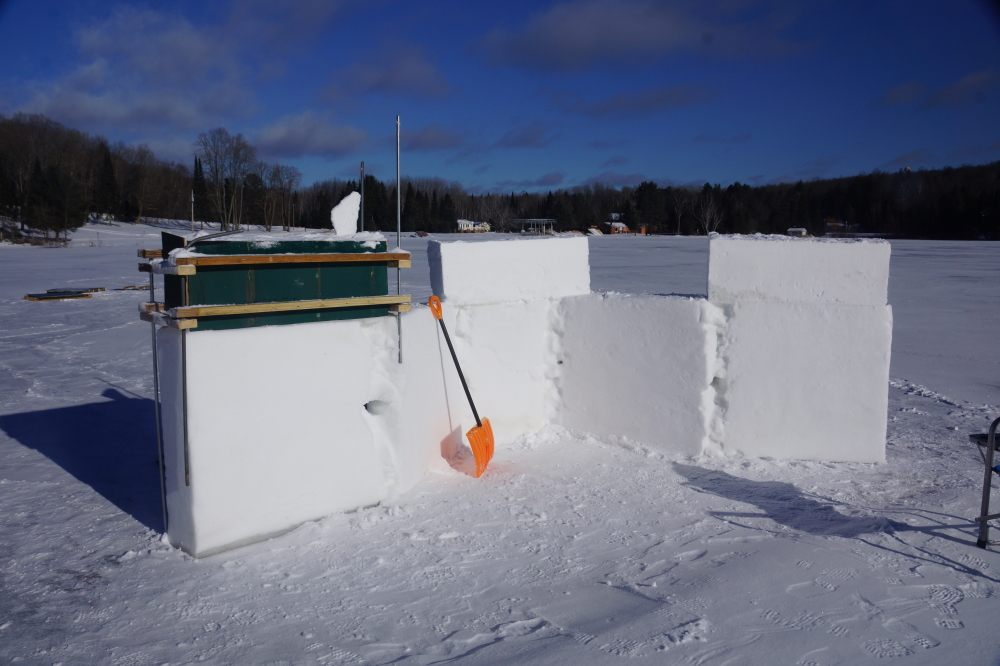 Fort construction continued on Friday. The wet and then cold made for a very solid base on the South's wall. Noggin protecting toppers were created using the snow that had collected in 2 inch drifts around the building.