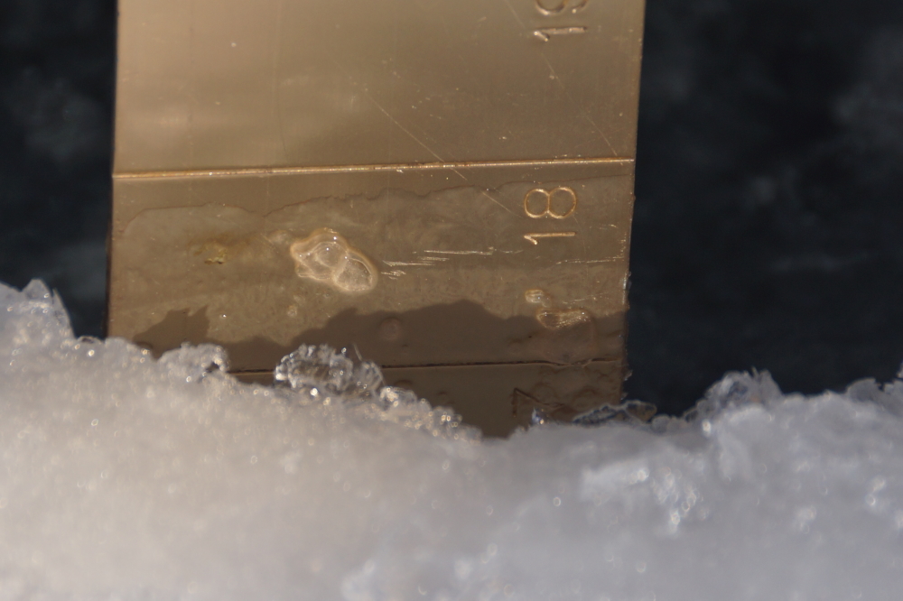 Under all those forts and rocket sticks, there's close to 18 inches of ice on the lake.