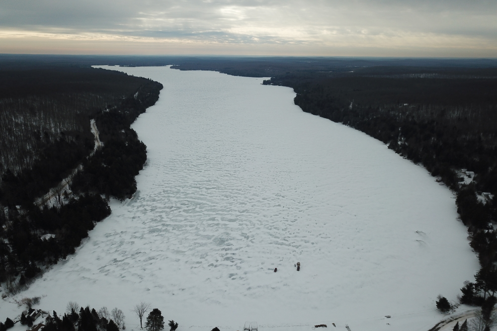 The warm continues into the weekend. With the lake's snow cover almost gone, car and truck traffic on the North end was at an all time high. This could come to an end soon. There's forecasts of a half a foot or more of blowing, drifting snow coming. That will make the lake-ice truckers stuck and sad, but the snowmobilers zoomy and happy. If you listen closely, you can already hear their 2-cycle cheers and laughter bouncing off the pines.<br><br><br>-Nemo can't limbo like that.