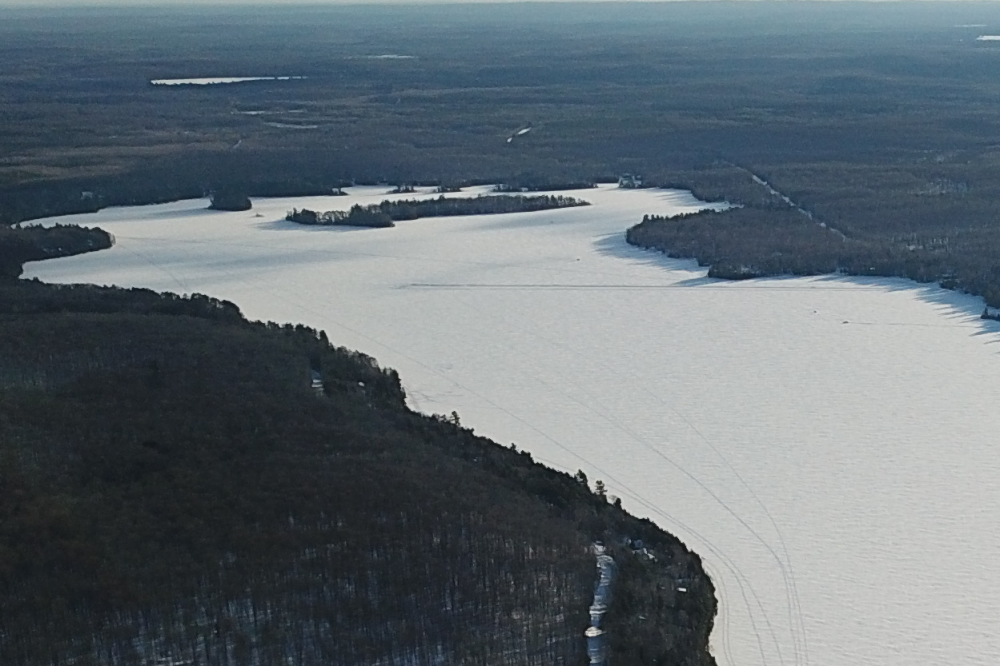 A runway was plowed in front of Water's Edge before the snow. Looks like they'll have to plow it again before they use it.