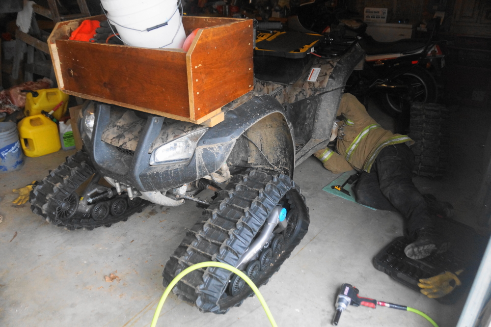 With the maple syruping season drawing ever closer, it was determined that now was the time to put the feet back on the ATV. There was surprisingly little cursing and just a few injuries.