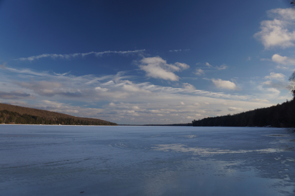 Last week started with typical early Spring weather. The temperatures slowly showed an above freezing trend, creeks began to flow, and puddles formed on the lake. Ice-out was just a week or so away, or so we thought. Winter had other plans.
