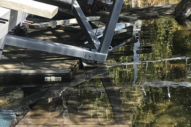The lake is up! It was 1978 since we've been this high (25 inches above the nail). Some docks are now rafts.