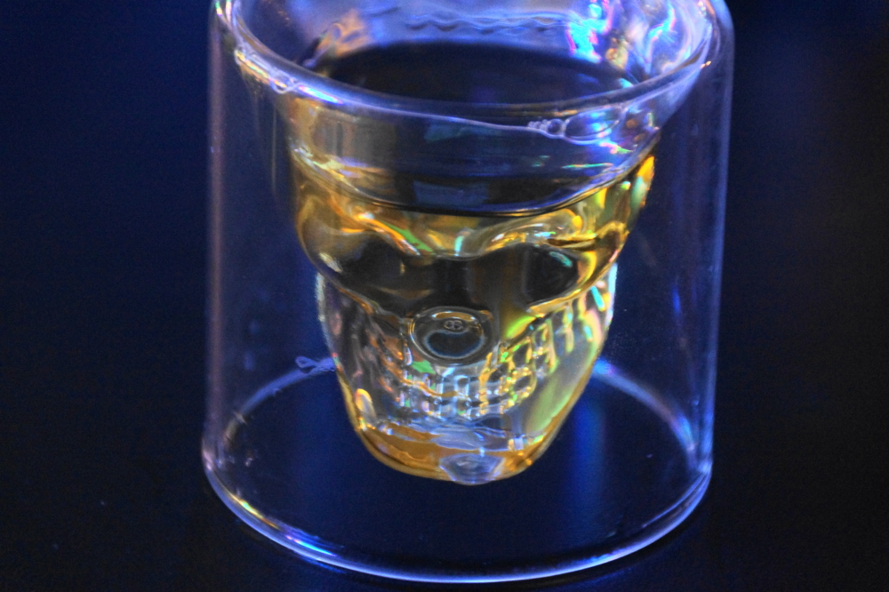 There were many bottles with just a bit of dubious liquid in them. It seemed like a good idea to use "Skull Shots" and a simple dice game to render the bottles harmless.