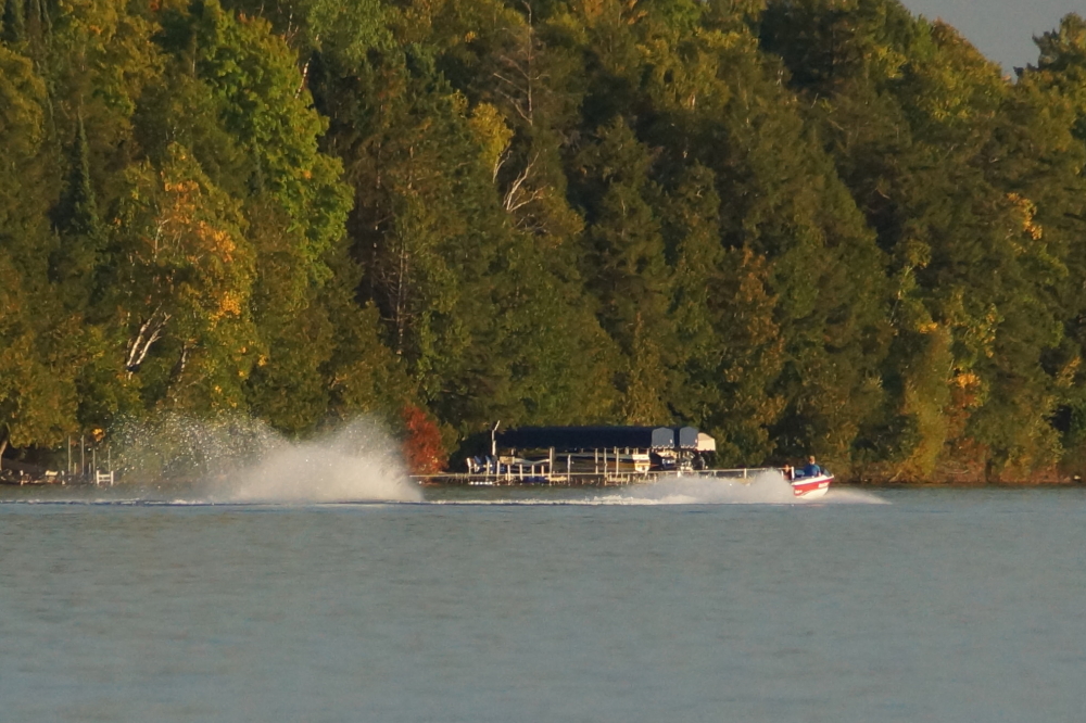 The water temperature is close to 75°F. There were swimmers, divers, skiers, and footers.