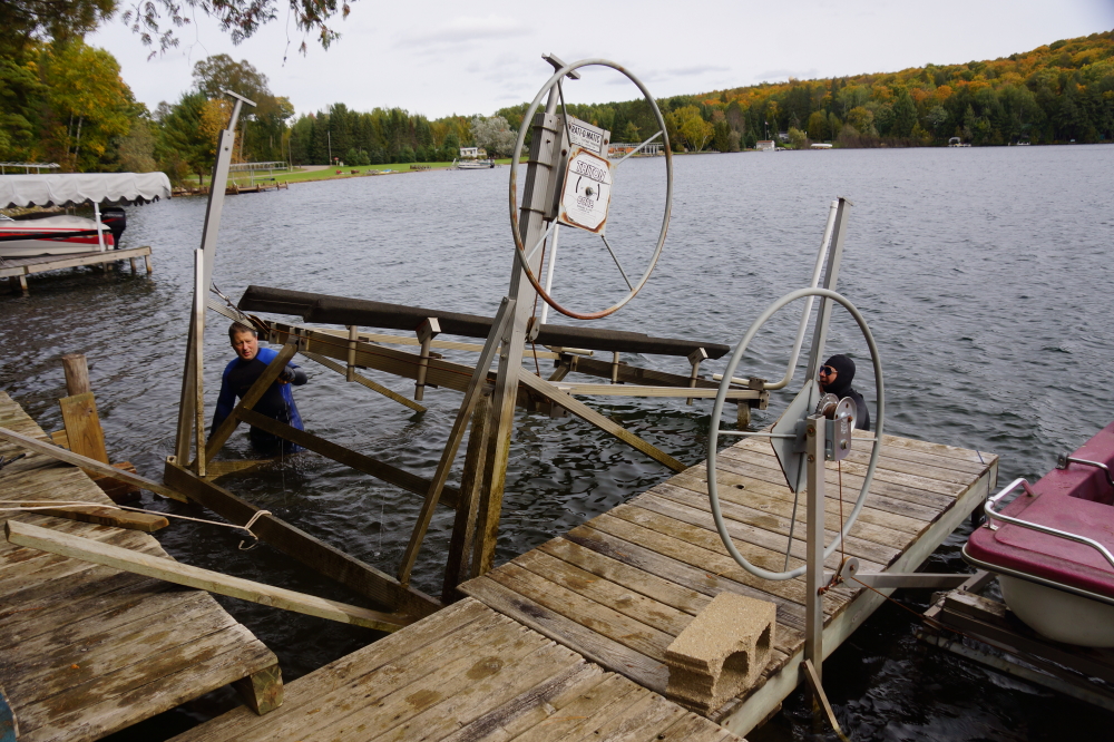 On the weekend it was deemed time to pull the lifts, raft, and piers. Our small crew finished the job amazingly fast with surprisingly few injuries. I wore a hat.