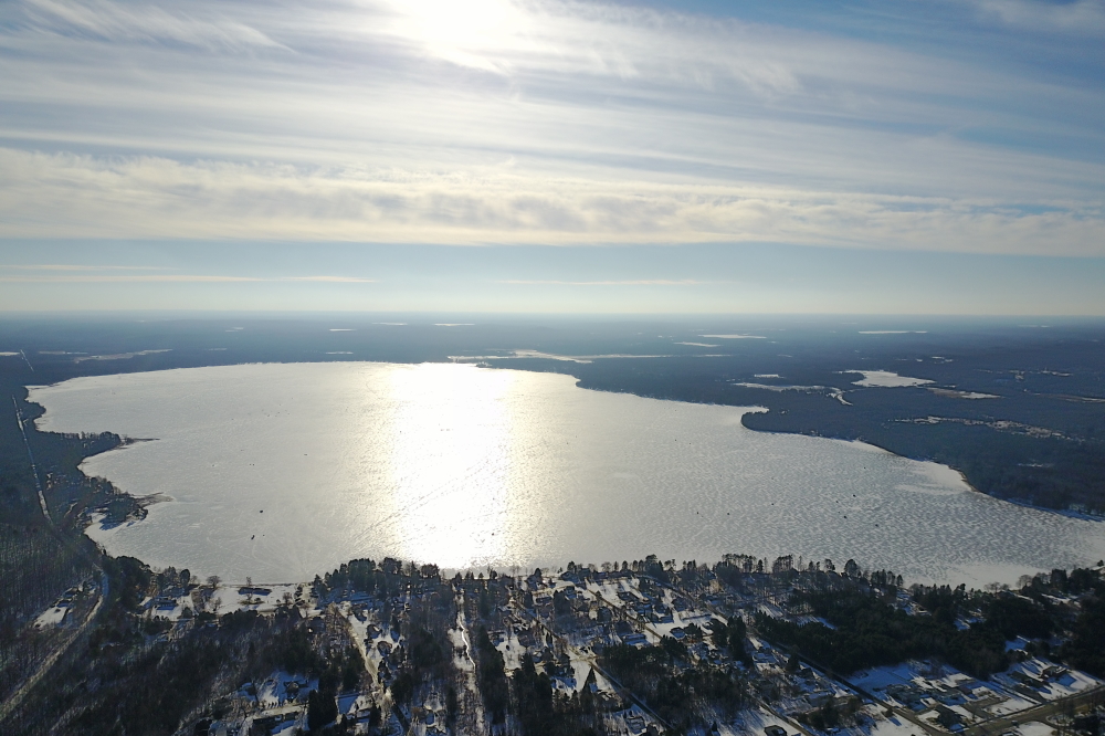 It was (is) time to pull up an ice hole and plant some bait. Not on Lake Lucerne, though. We contend that there are no fish in Lake Lucerne during the Winter. Lake Metonga, on the other hand, has plenty as the many ice fishing shacks indirectly attest to.