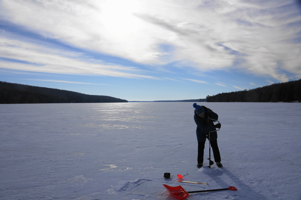 The snow is gone (mostly) but there's plenty of lake ice. It took awhile to drill through it to see just how much.