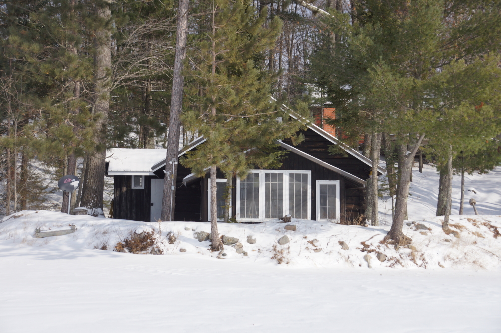 The conditions gave many the chance to do a Winter tour of the lake without those pesky walking-for-miles-in-deep-snow induced heart attacks. Last Summer during a presentation at the LLAA club house by the local historic society, we were told that this is one of the oldest cabins on the lake.