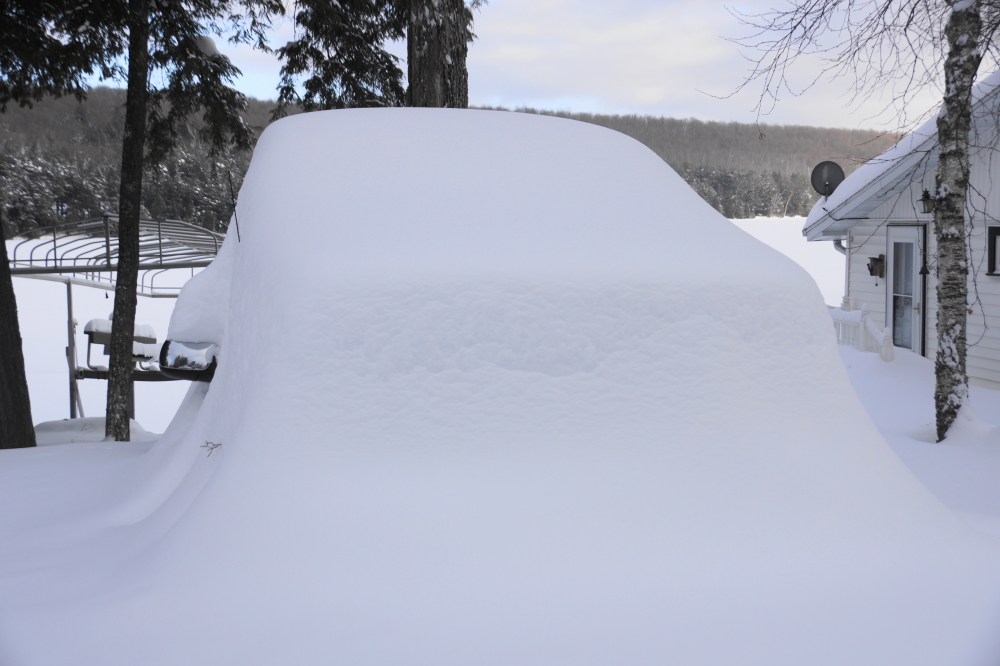 Trucks can be hard to find when they become snow mounds, but if you look closely a mirror or antenna is a dead giveaway. The height of the pile is the best way to differentiate between trucks and cars.