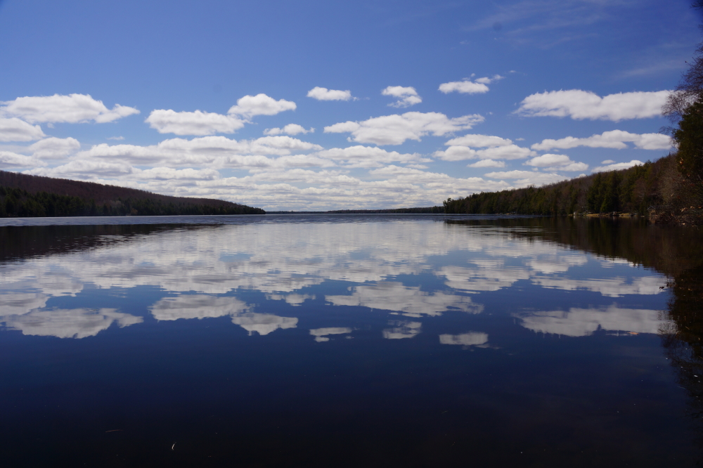 The open water was very flat. The ice on the edges was about a half an inch thick. The ice farther from the edge was over 3 inches thick and quite impassible.