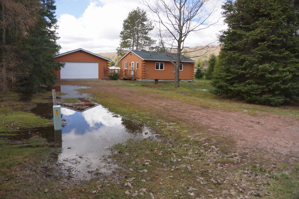 If the lake continues to rise, garages will be able to double as boat houses and cabins as houseboats.