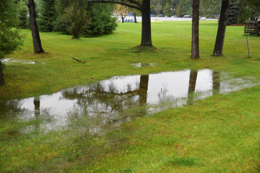 Small ponds sprouted up in spots that were lawns just a day before. The lake level is down 4 inches from its peak back in July and August, but more of these late season monsoons will push it back up to those record levels and beyond.