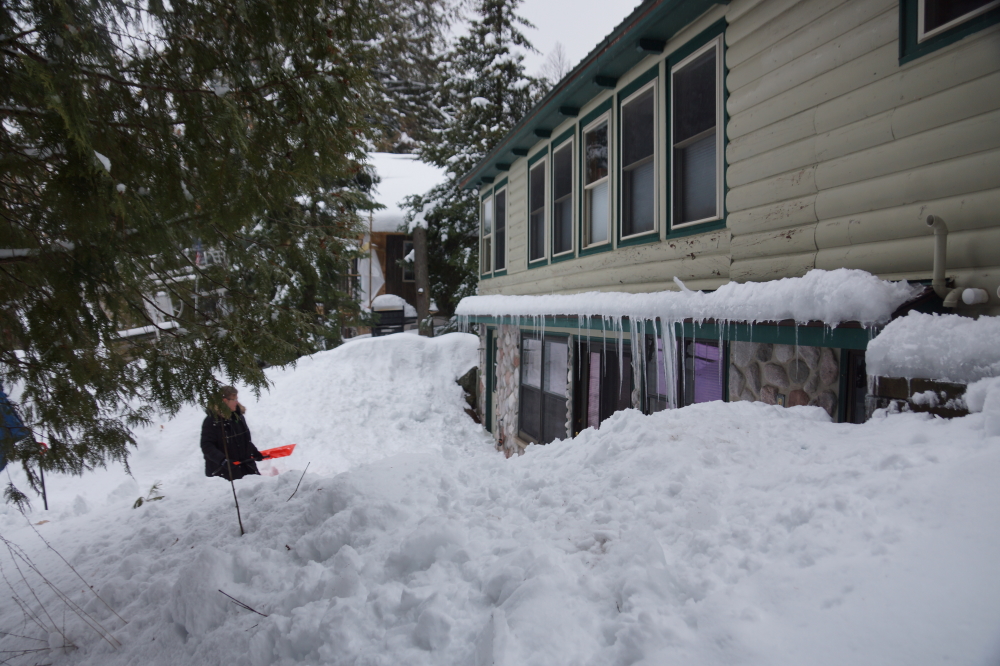 Warmer temperatures slid clear metal roofs. This created instant deep piles of heavy snow and slush in front of entry ways. It took two days to carve a path (KNIGHTS OF NI: A path! A path! A path!) to the door. 