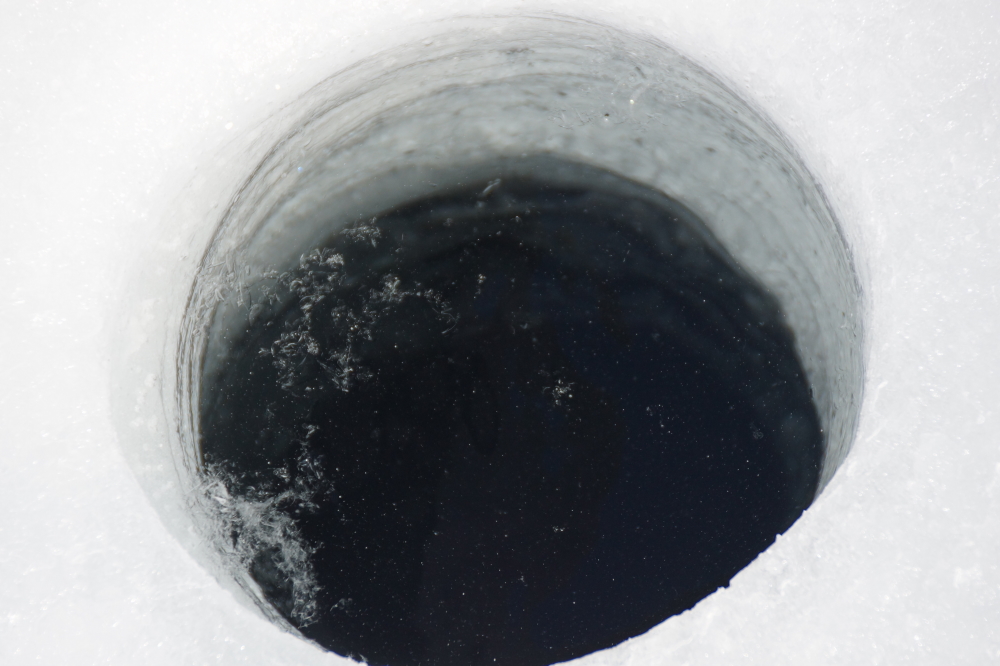 The ice covering Lake Lucerne has two distinct layers. The top 5.5 inches is the more airy, frozen snow type ice. The rest is the crystal clear, super hard type. Both layers will need to be gone before anyone wins this year's ice-out contest...<br><a href='/iceout/IceOut2020.html'  target='_blank'>Annual Ice-Out Contest Link</a>