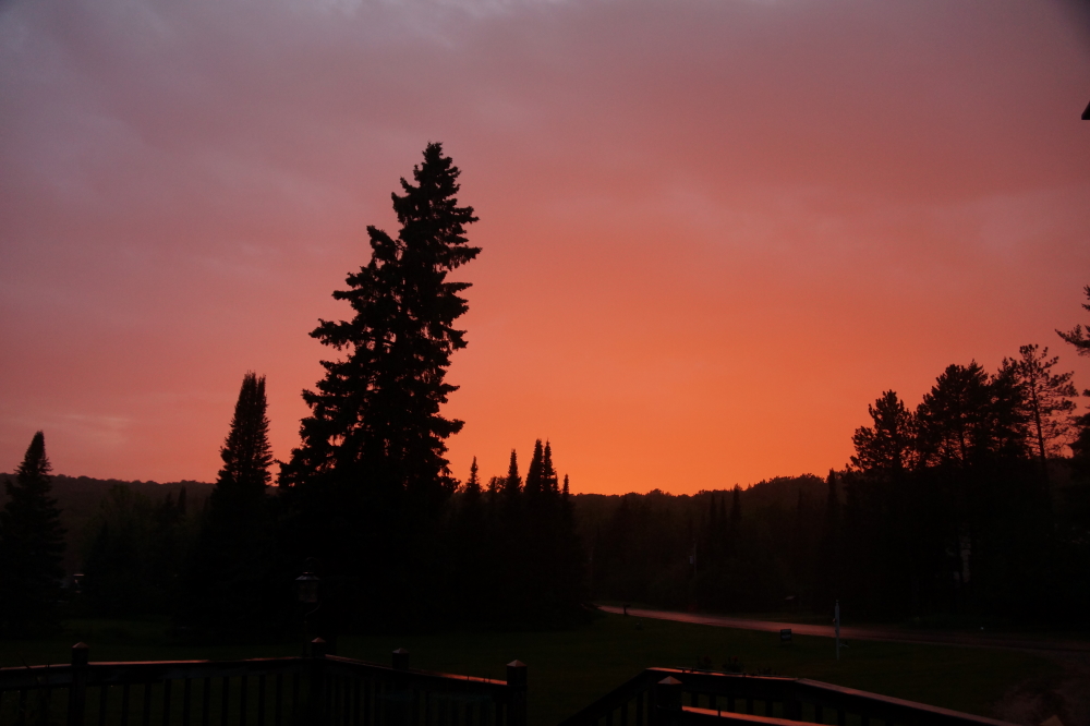 The end of the week started with a little rain and a very red, humid sunset. Then the real rain came.